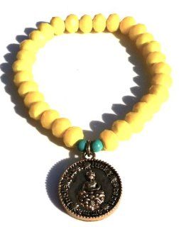 Jubel & Stern yellow stretchy bracelet made of crystals, elastic, with turquoise natural stone and Buddha as coin pendant: Jewelry