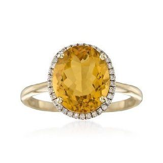 4.20 Carat Oval Citrine and Diamond Ring in 14kt Yellow Gold. Size 7: Jewelry