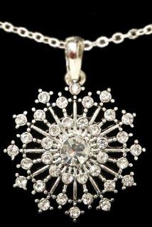 From the Heart Beautiful Christmas Star Burst Necklace with "Crystal" Clear Rhinestones Sparkling on 18 inch Chain. Approximately 1.5 inches long & 1 1/4 inch wide.So Beautiful it could be worn with Formal Attire or every day wear.Mailed in a