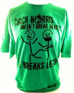 Chuck Norris Mens T Shirt   Doesn't Break Hearts, He Breaks Legs: Clothing