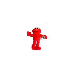 Gund Sesame Street: Elmo 9" Plush Doll: Toys & Games