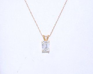 14K Yellow Gold Emerald cut CZ Pendant: Jewelry