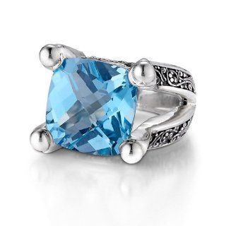Sterling Silver This eye catching Sara Blaine sterling silver ring features a 14mm faceted blue topaz: Sara Blaine: Jewelry