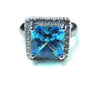 Jules Cocktail Ring Princess Cut Aquamarine Blue Cubic Zirconia 18K White Gold Plated Ginger Lyne Collection: Jewelry