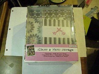 Colorbok Albums & Photo Storage Containing 1 Brag Book which holds 36 4"x6" Photos, 1 2 Up Photo Album which holds 200 4" x6" Photos and 1 storage box.  