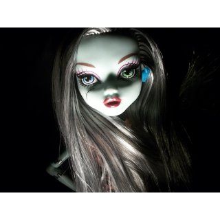 Monster High Frankie Stein Doll with Watzit pet: Toys & Games